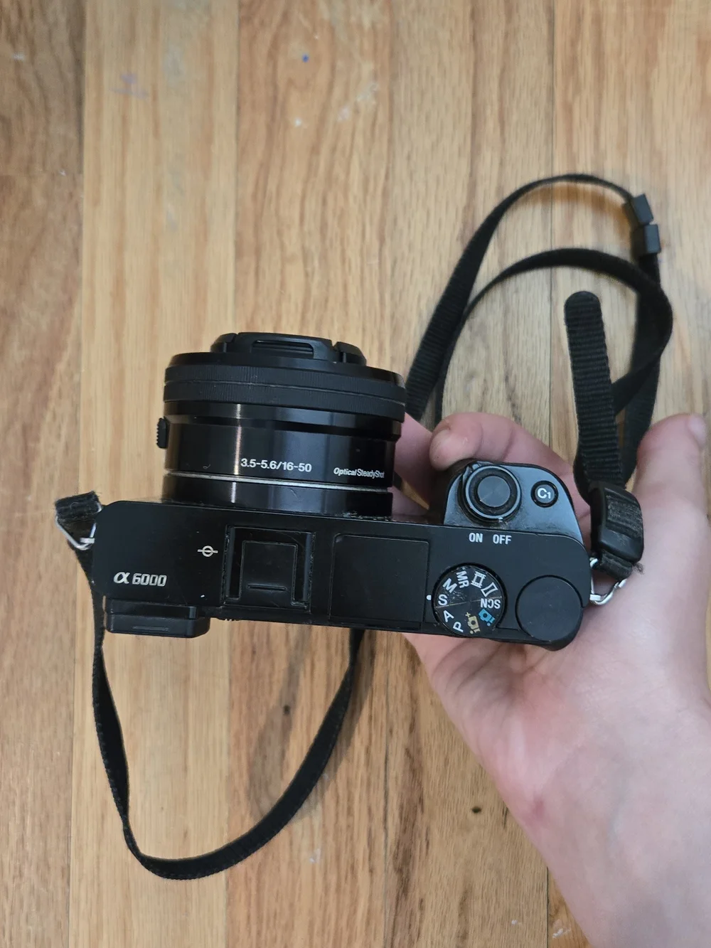 Sony Black Compact Mirrorless Camera with Black Case and Charger